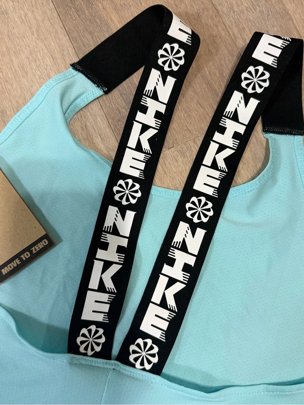 NIKE Women's Light Blue Tank with Black Logo Straps